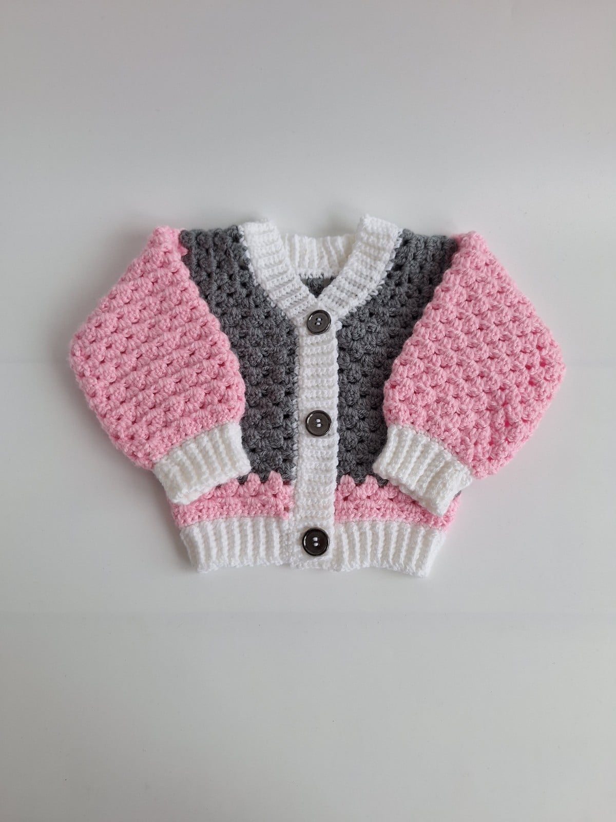 Gehaakt baby vestje | Roze, grijs en wit