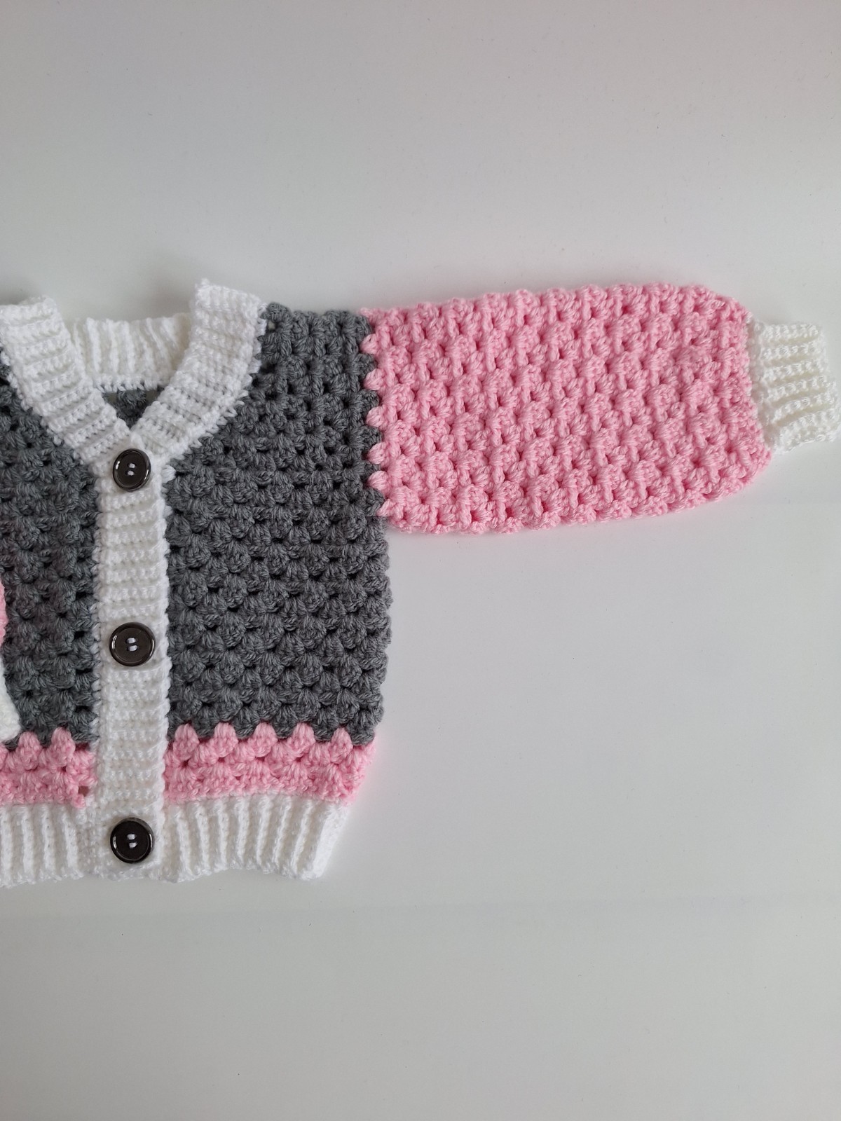 Gehaakt baby vestje | Roze, grijs en wit