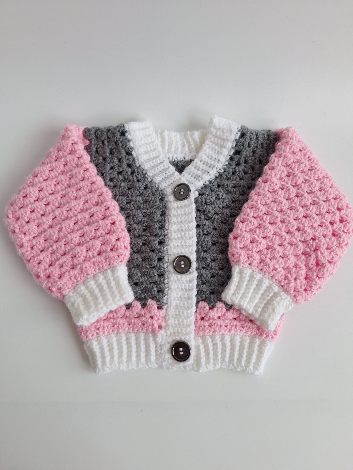 Gehaakt baby vestje | Roze, grijs en wit