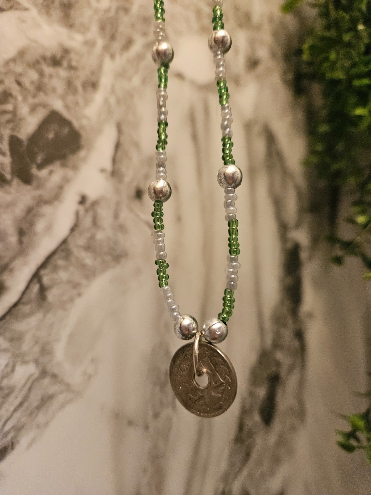 Kralenketting met muntje - 108425 Kralenketting met muntje