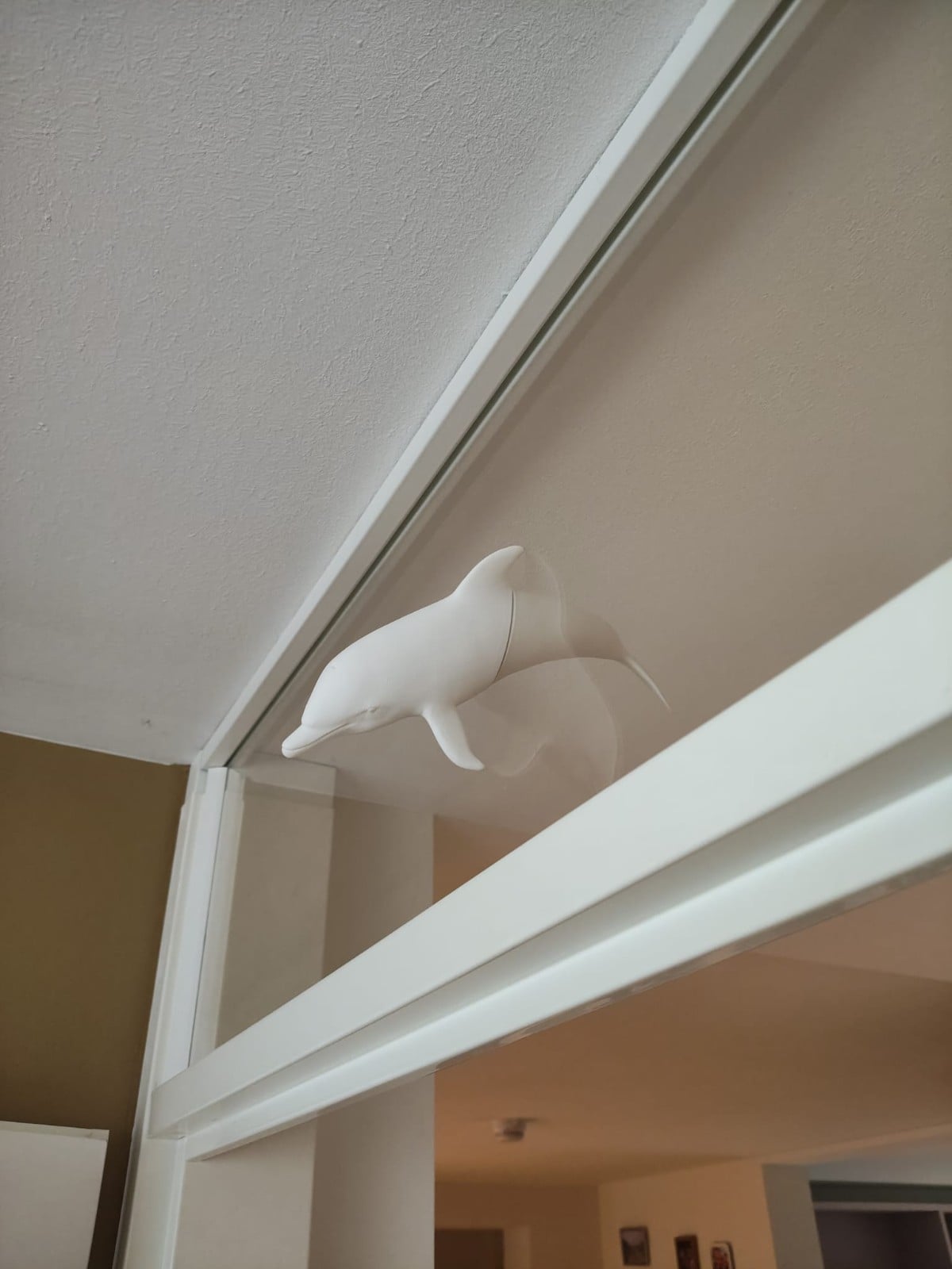 White dolphin window art