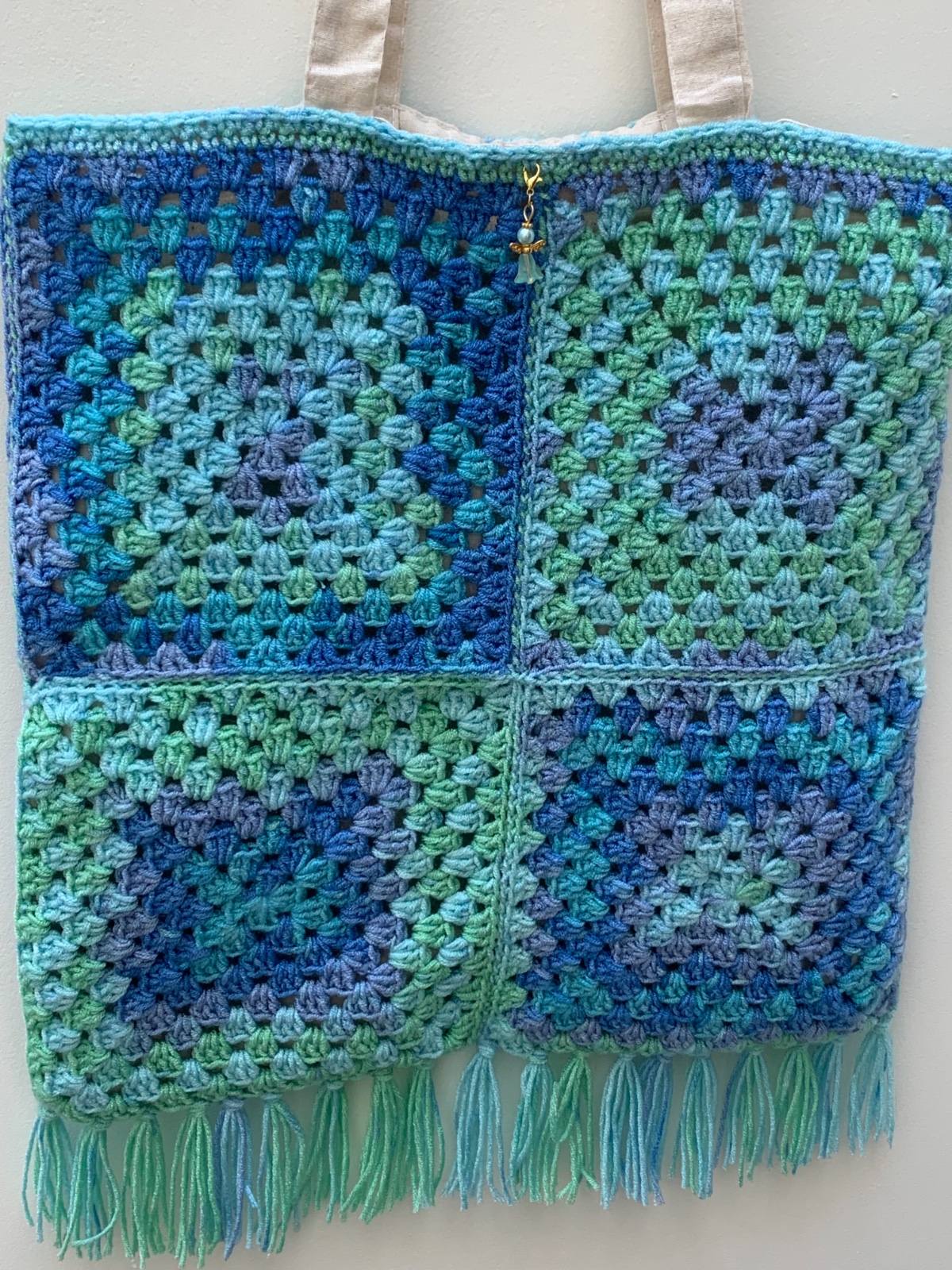 Tas Hobo/Style met sier ketting, veren en franjes.