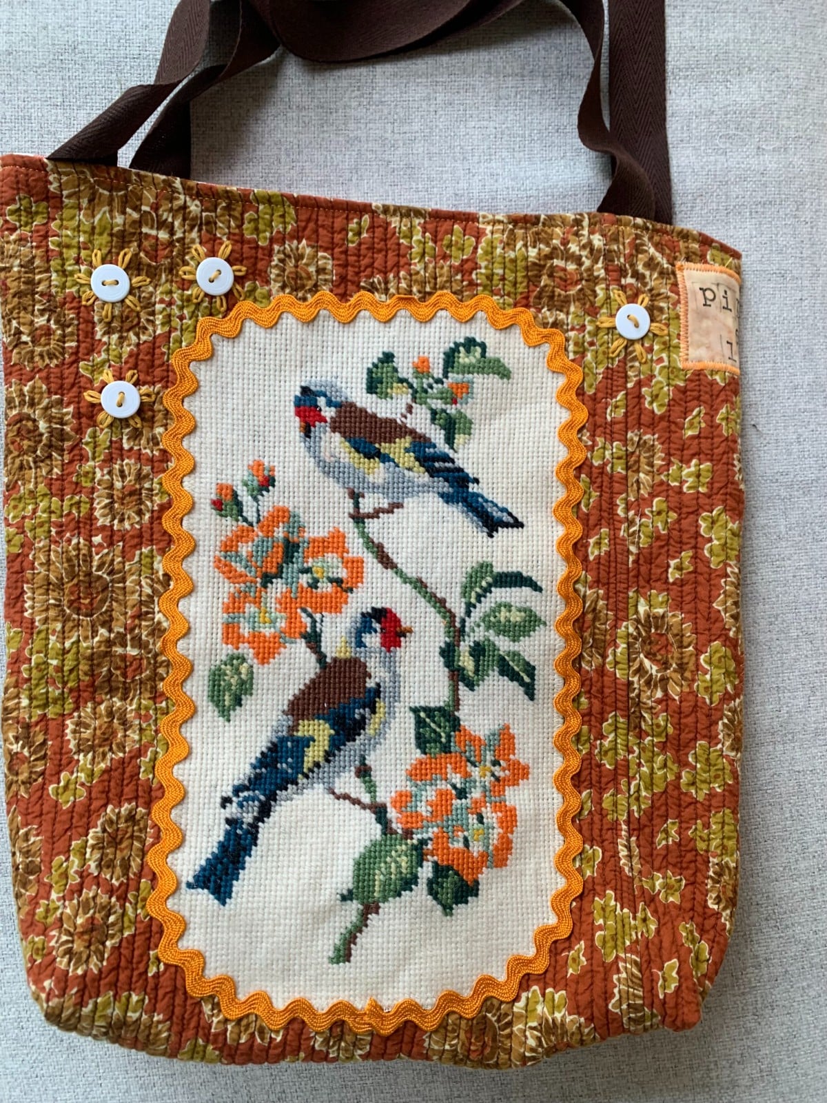 Tote bag met borduurwerk met puttertjes