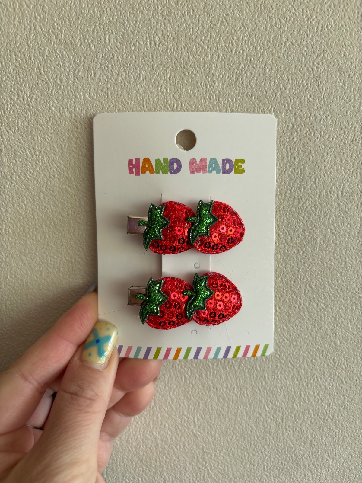 Alligator clips met aardbeien ?Rood)