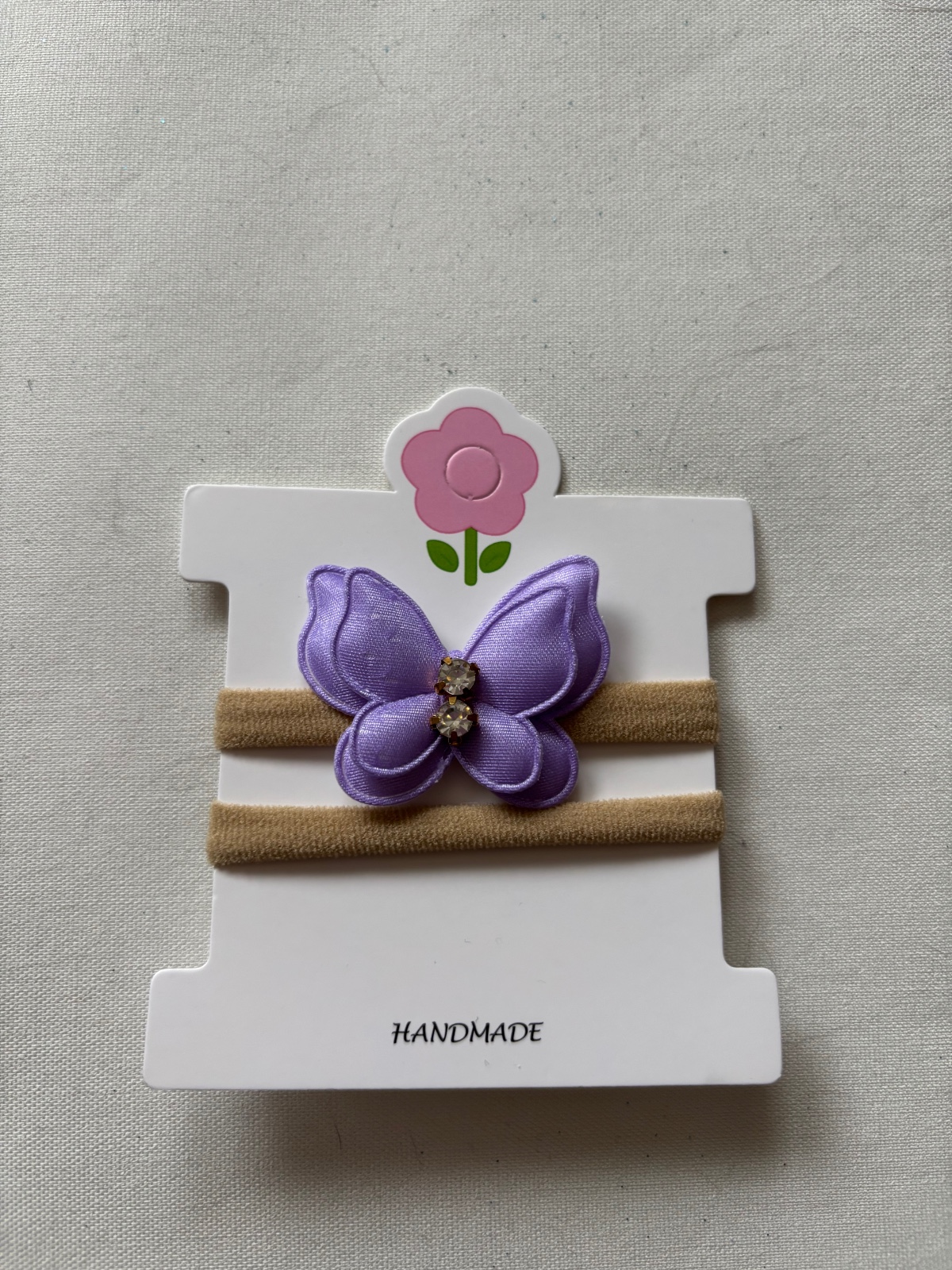 Baby haarbandje met vlinder