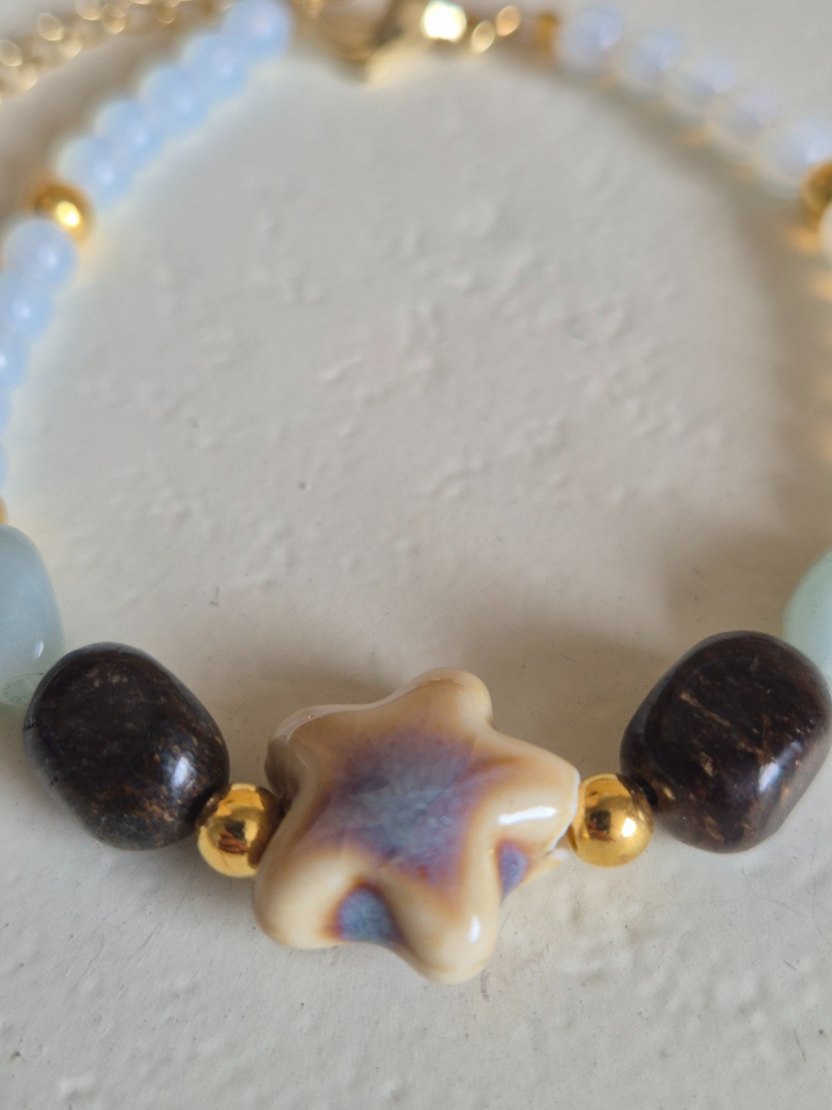 Gouden armband keramieken zeester - 137800 Gouden armband keramieken zeester