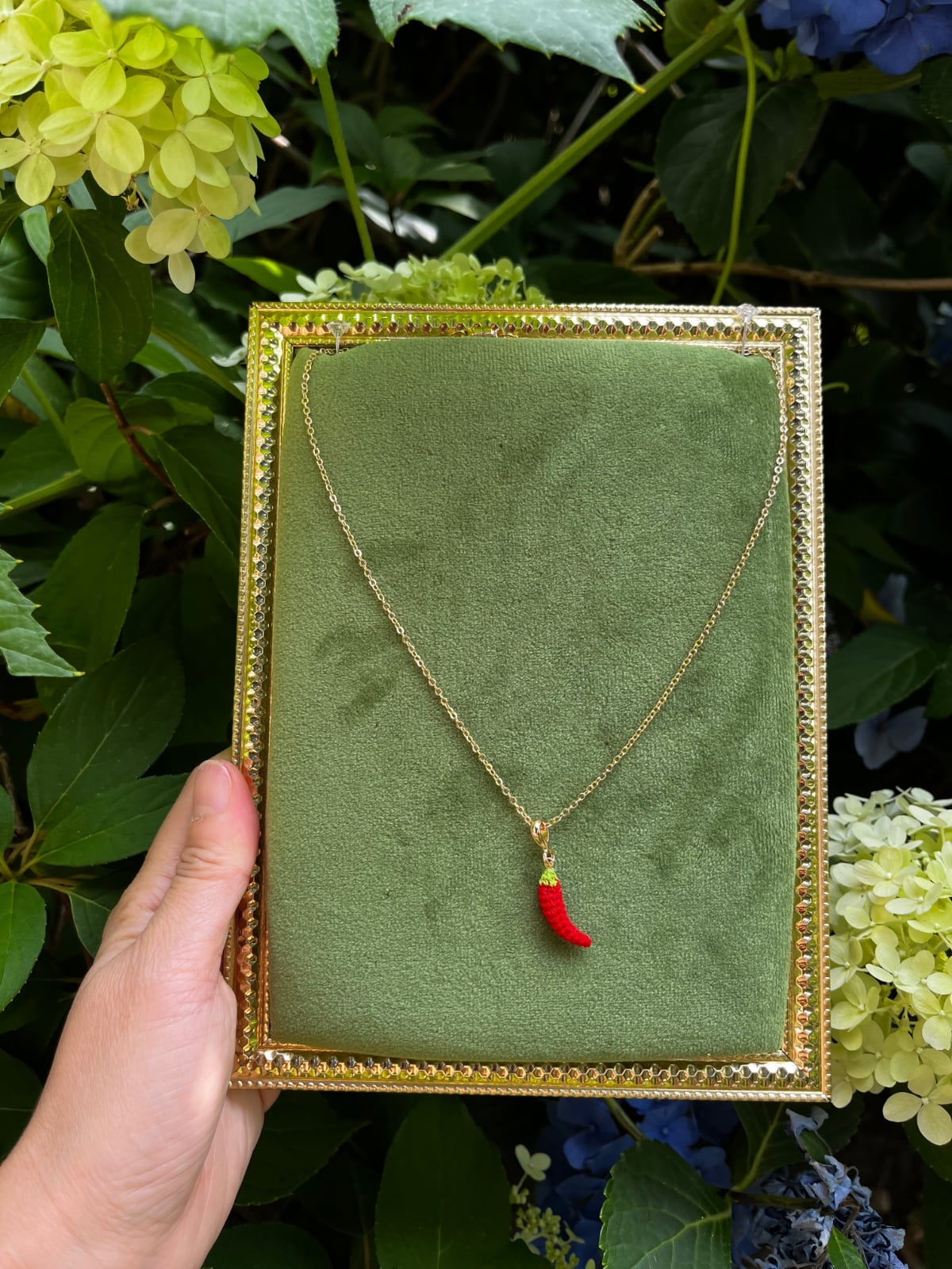 Miniatuur gehaakte chili ketting