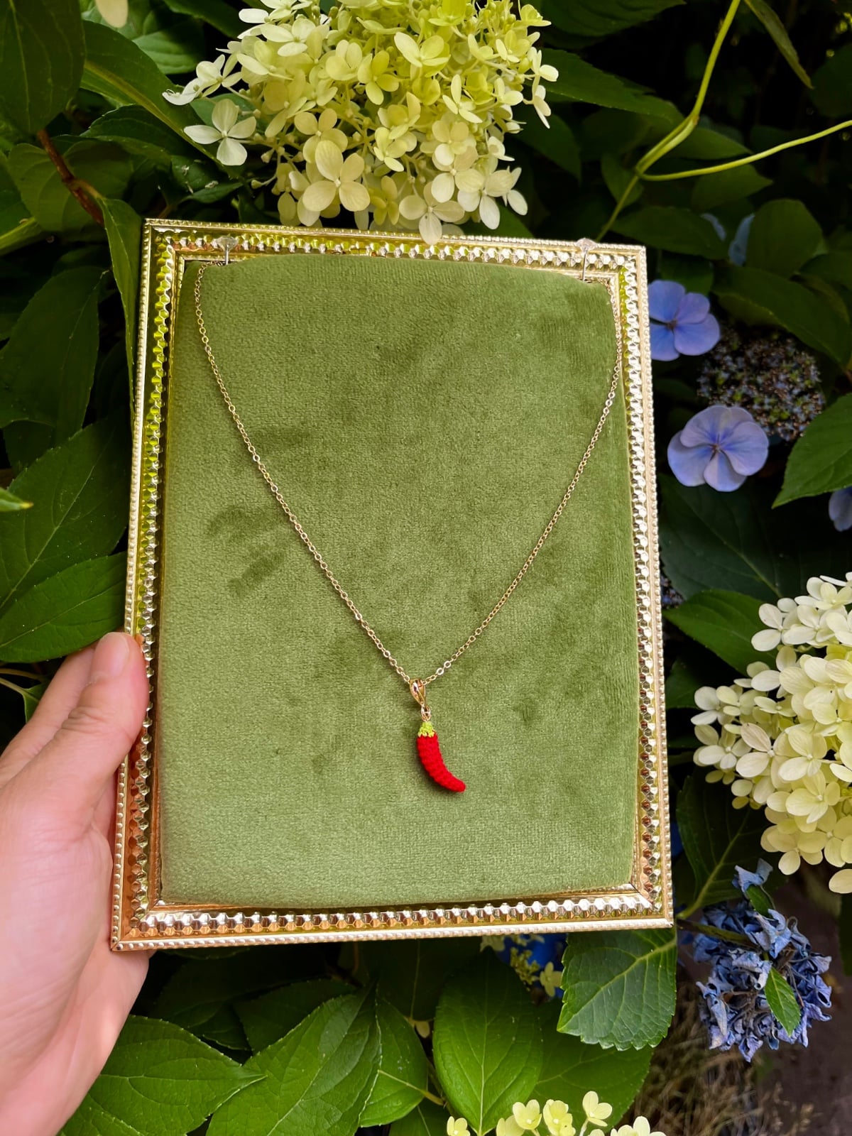 Miniatuur gehaakte chili ketting
