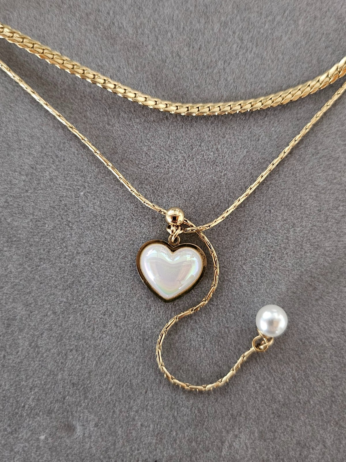 Dubbele ketting met parelmoer hart – RVS 16K verguld - 147326 Dubbele ketting met parelmoer hart – RVS 16K verguld