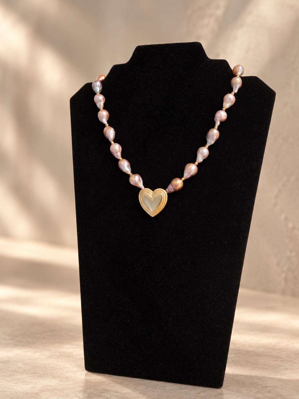 Roze barokparel ketting met vintage hartjeshanger