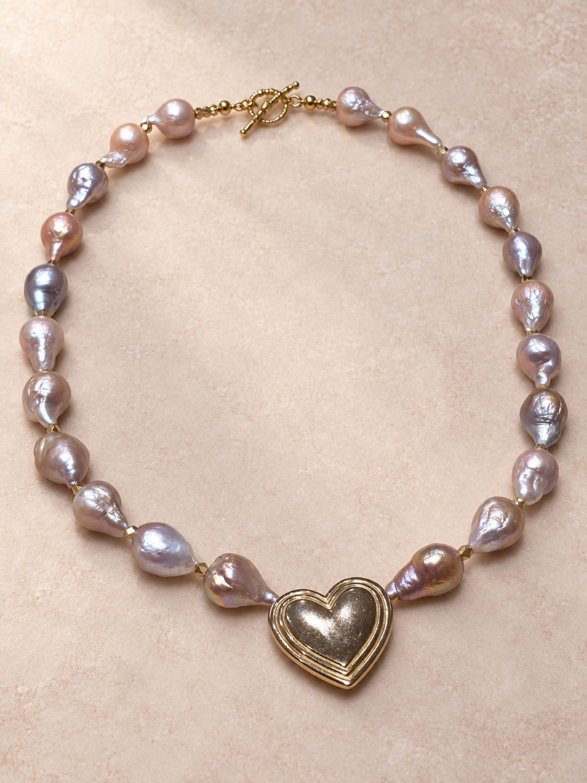 Roze barokparel ketting met vintage hartjeshanger