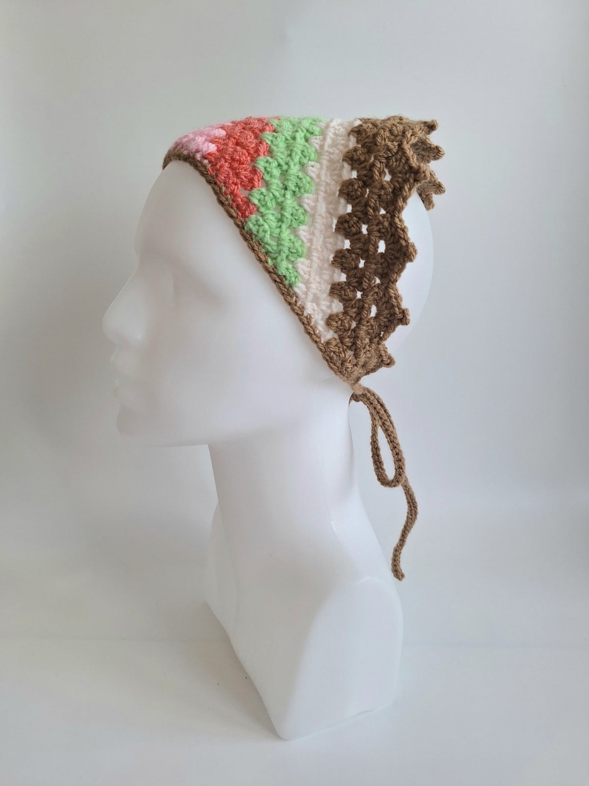 Gehaakte bandana | Lichtroze, koraaloranje, lichtgroen, crème en lic… - 152563 Gehaakte bandana | Lichtroze, koraaloranje, lichtgroen, crème en lichtbruin