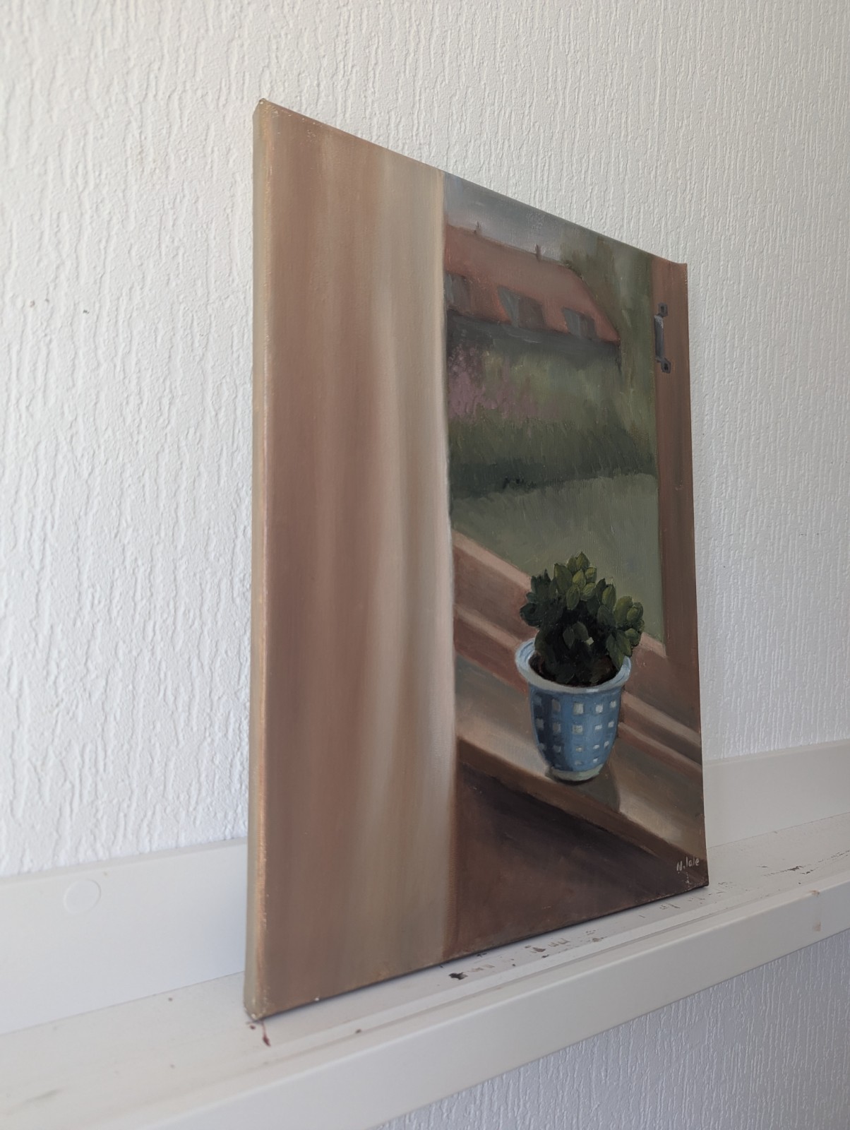 Flower by the window
