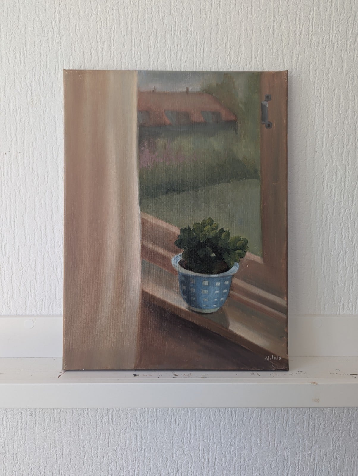 Flower by the window
