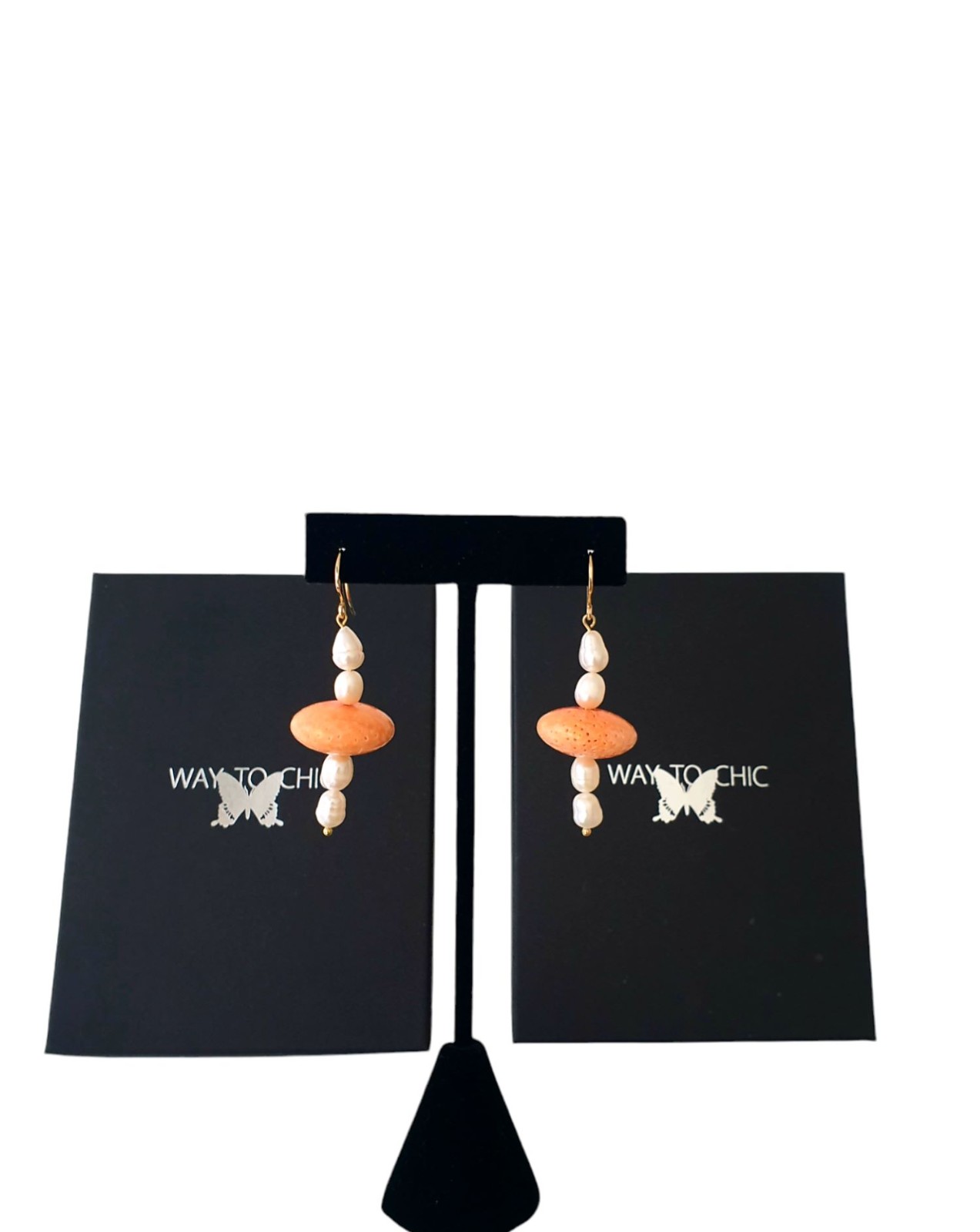 Koraal en pareloorbellen