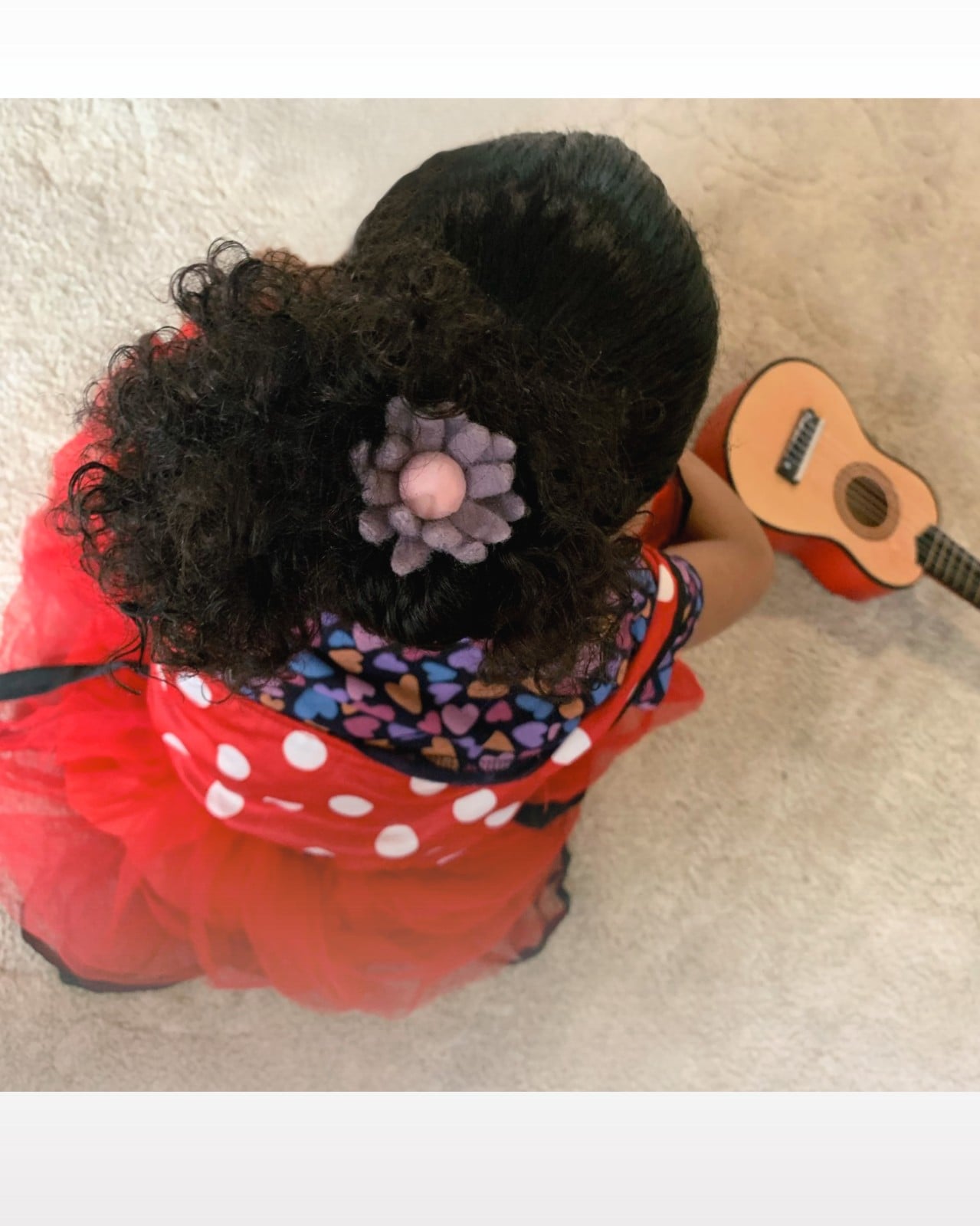 Vivy [haarelastiek bloem van wol]