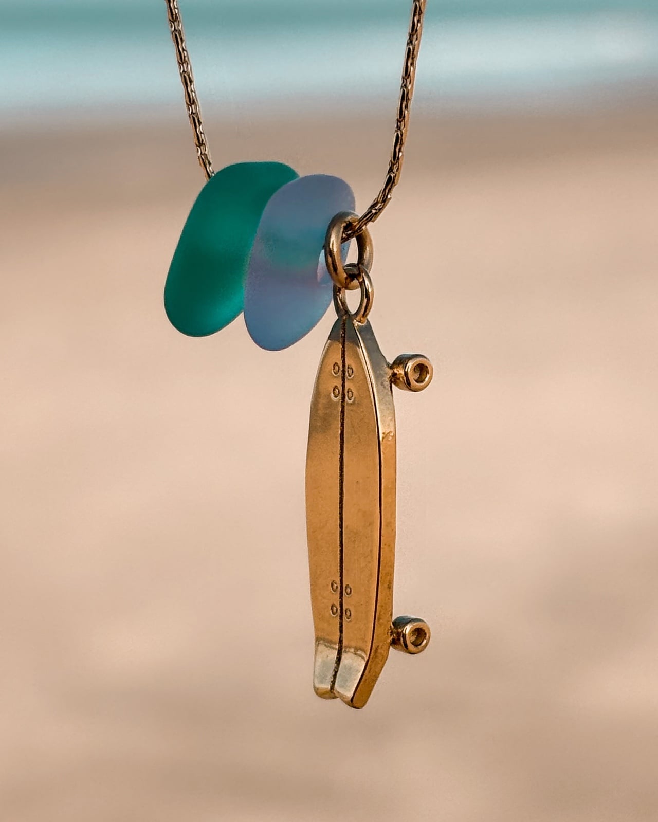 zeeglas Surfskate ketting goud