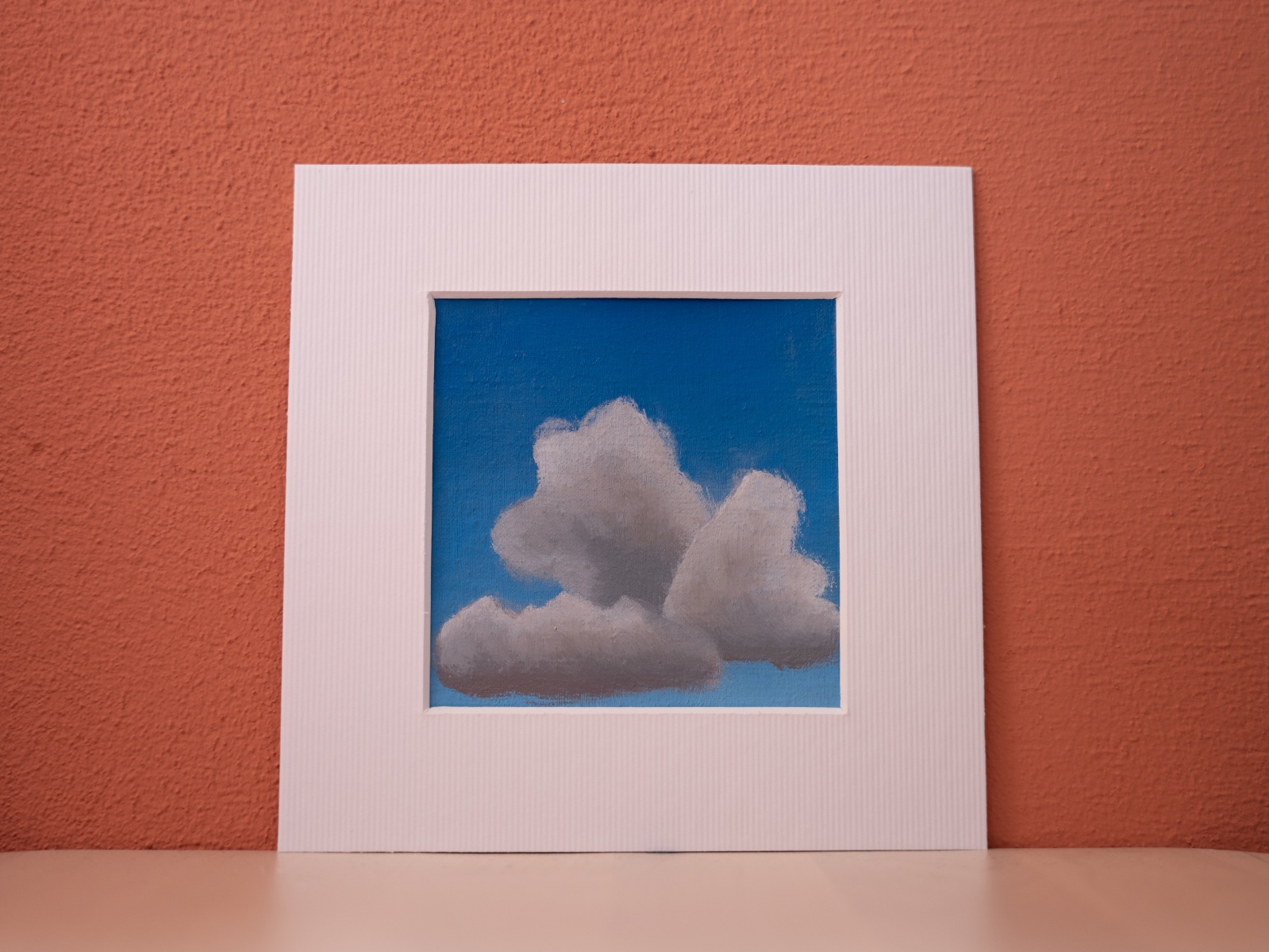 Klein schilderij grijze stapelwolk