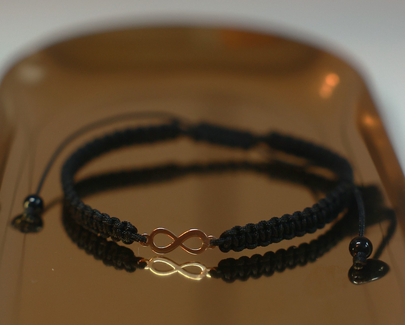 Armband met 14 karaat geelgouden Infinity bedel