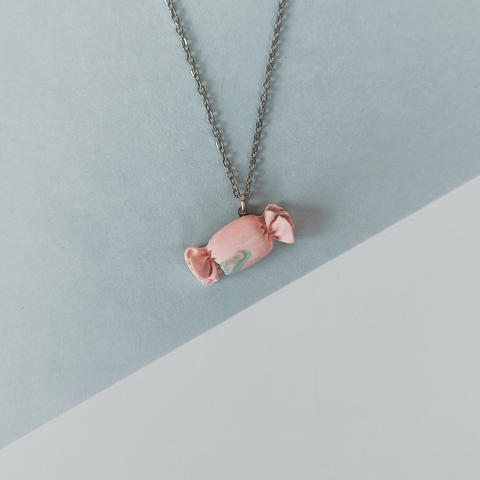 Ketting met pastel roze snoepje