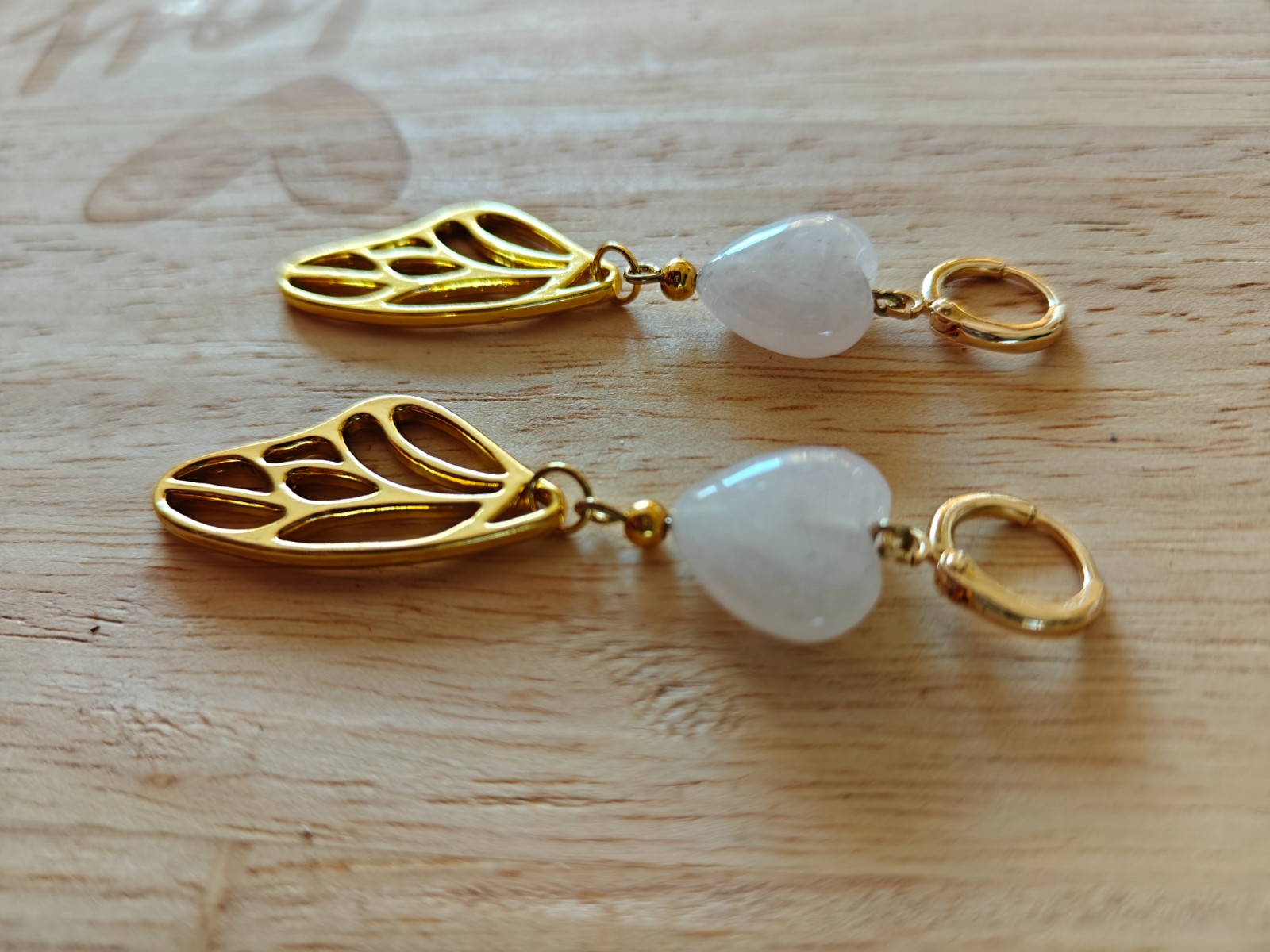 Rozenkwarts oorbellen in flesje