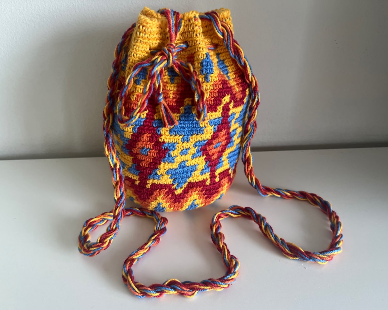 Kleurijk mochila buideltje - 142362 Blikvanger: kleurrijk handig mochila tasje