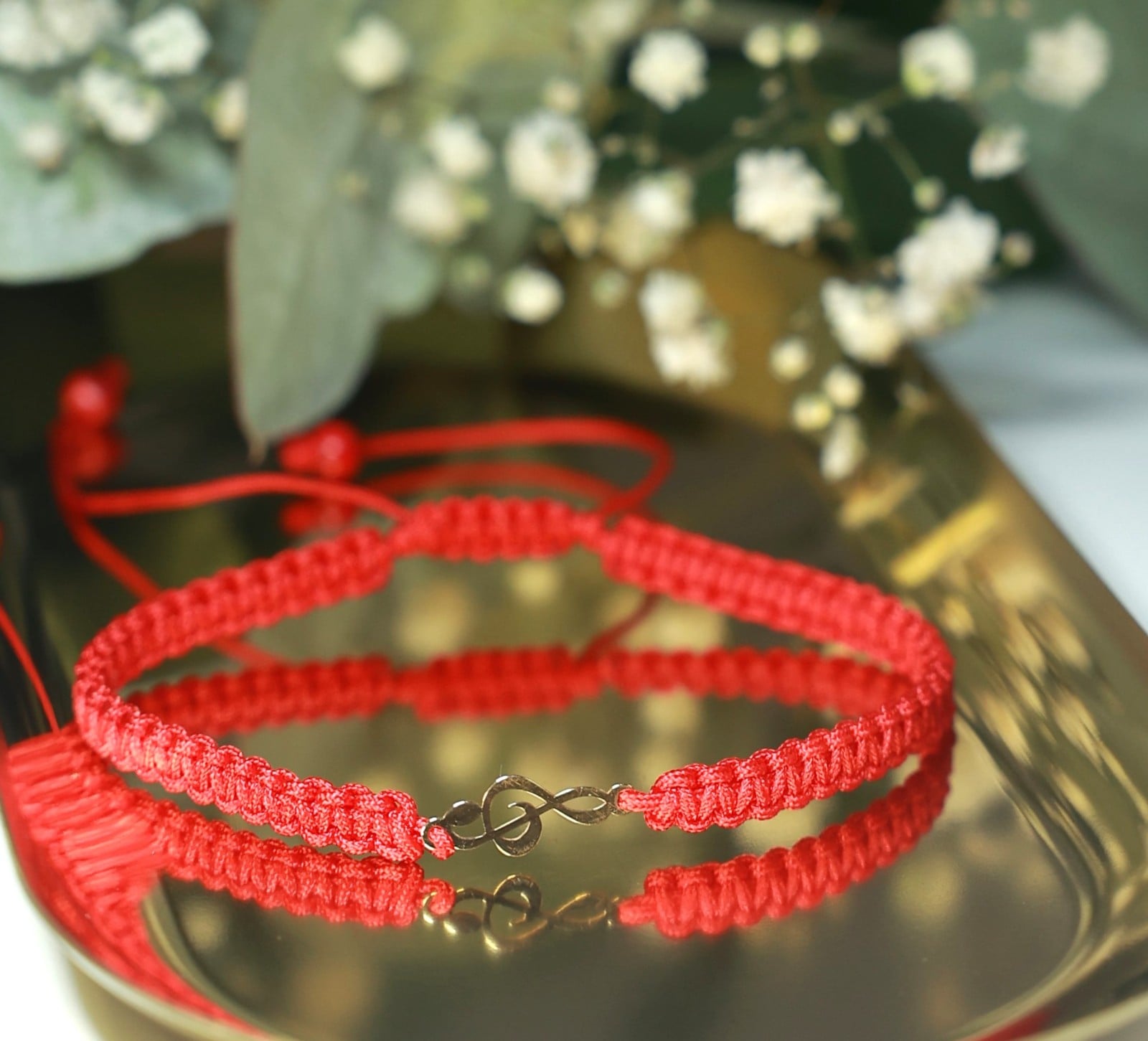 Armband met 14 karaat geelgouden muziek G-sleutel