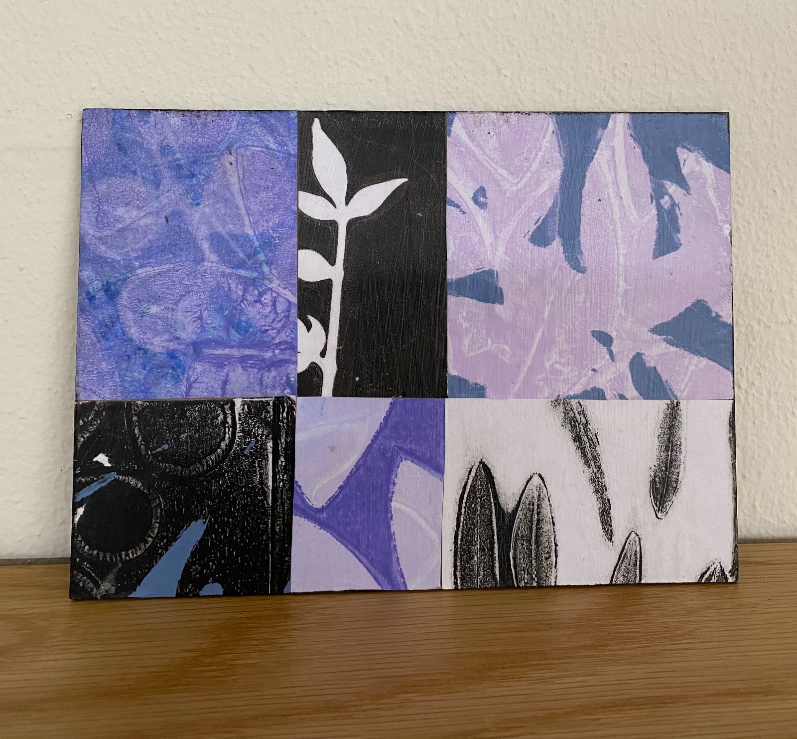 Houten kaart met monotype collage