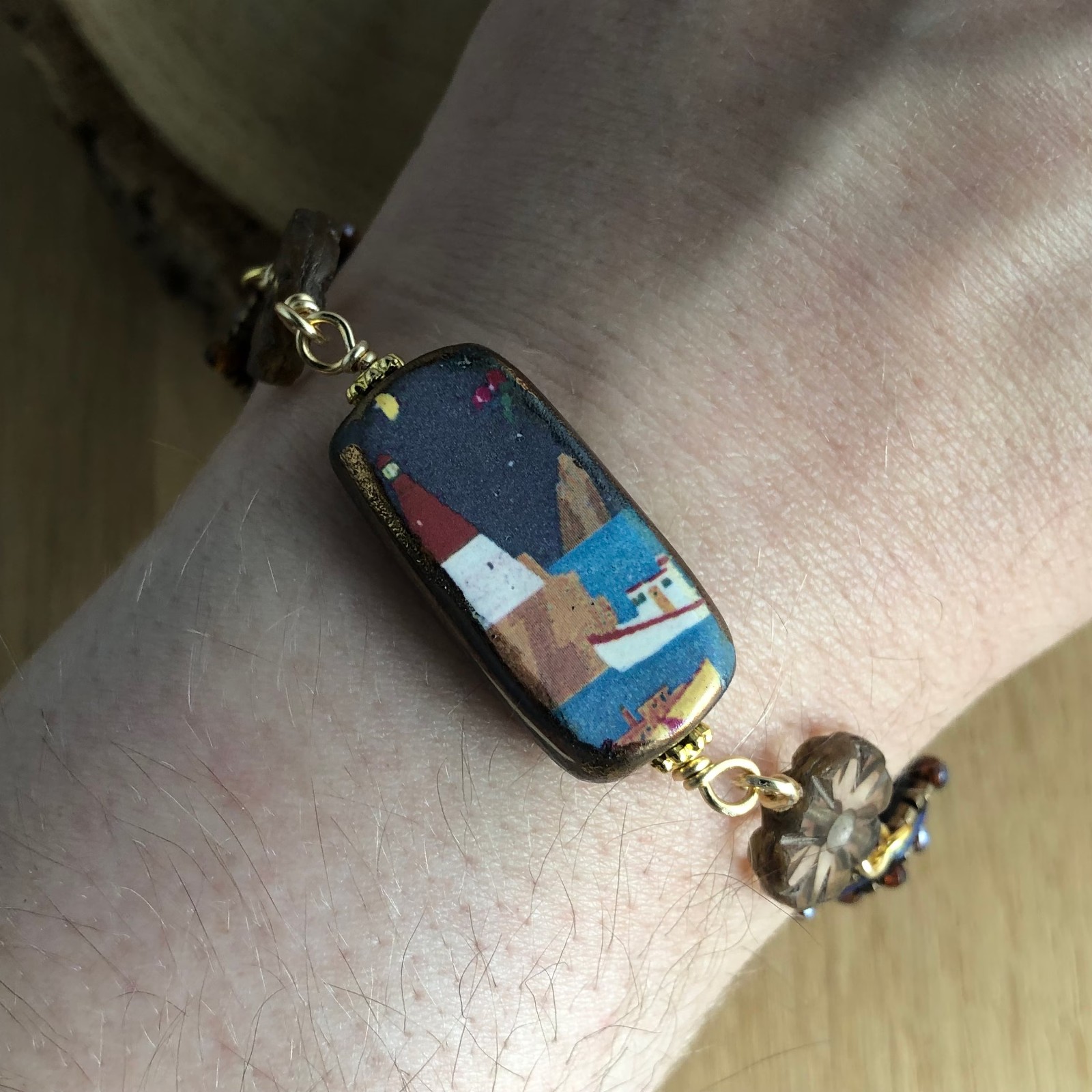 Hoop & Compassie, Vuurtoren armband met inspireerende text "be a lighthouse in someone elses storm"