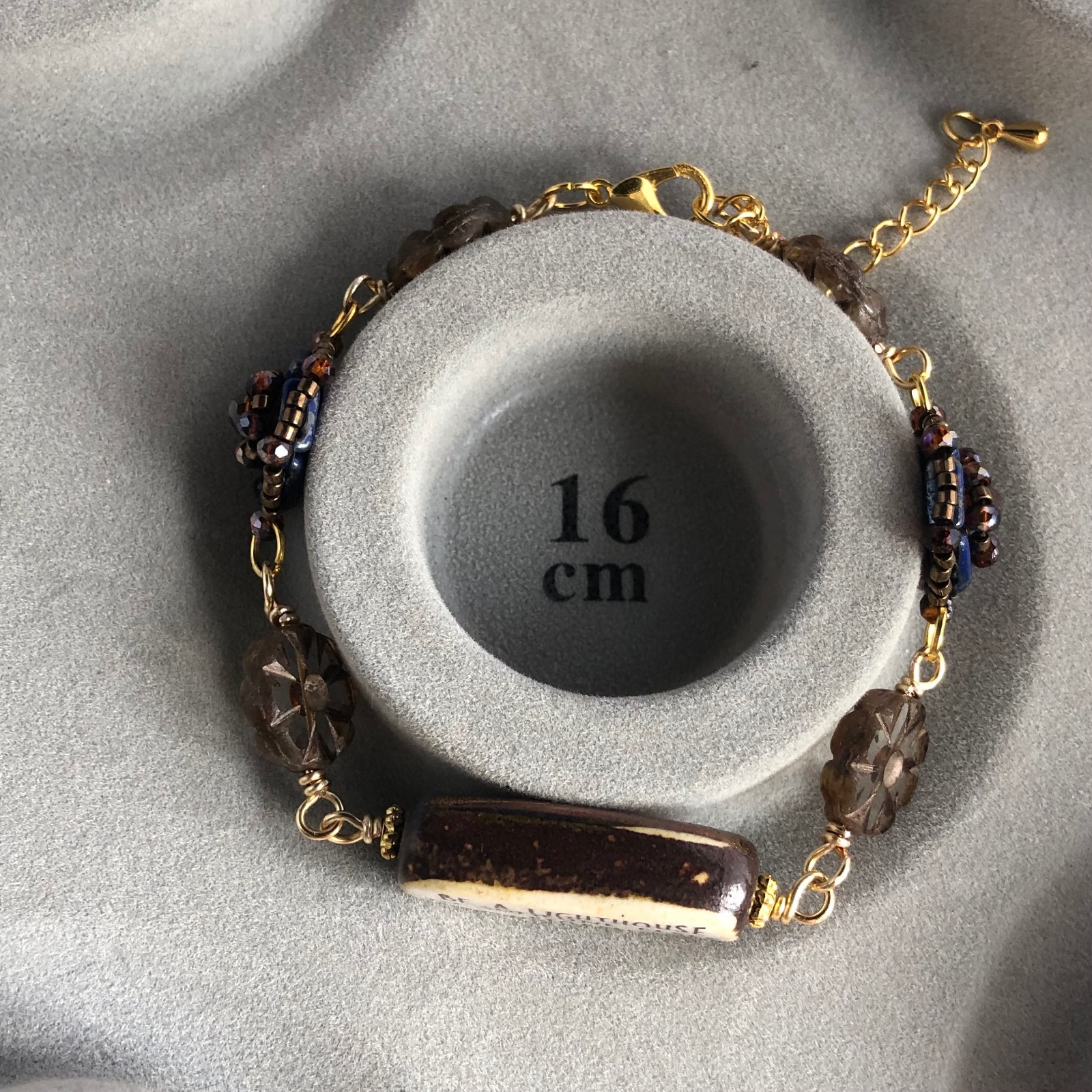Hoop & Compassie, Vuurtoren armband met inspireerende text "be a lighthouse in someone elses storm"