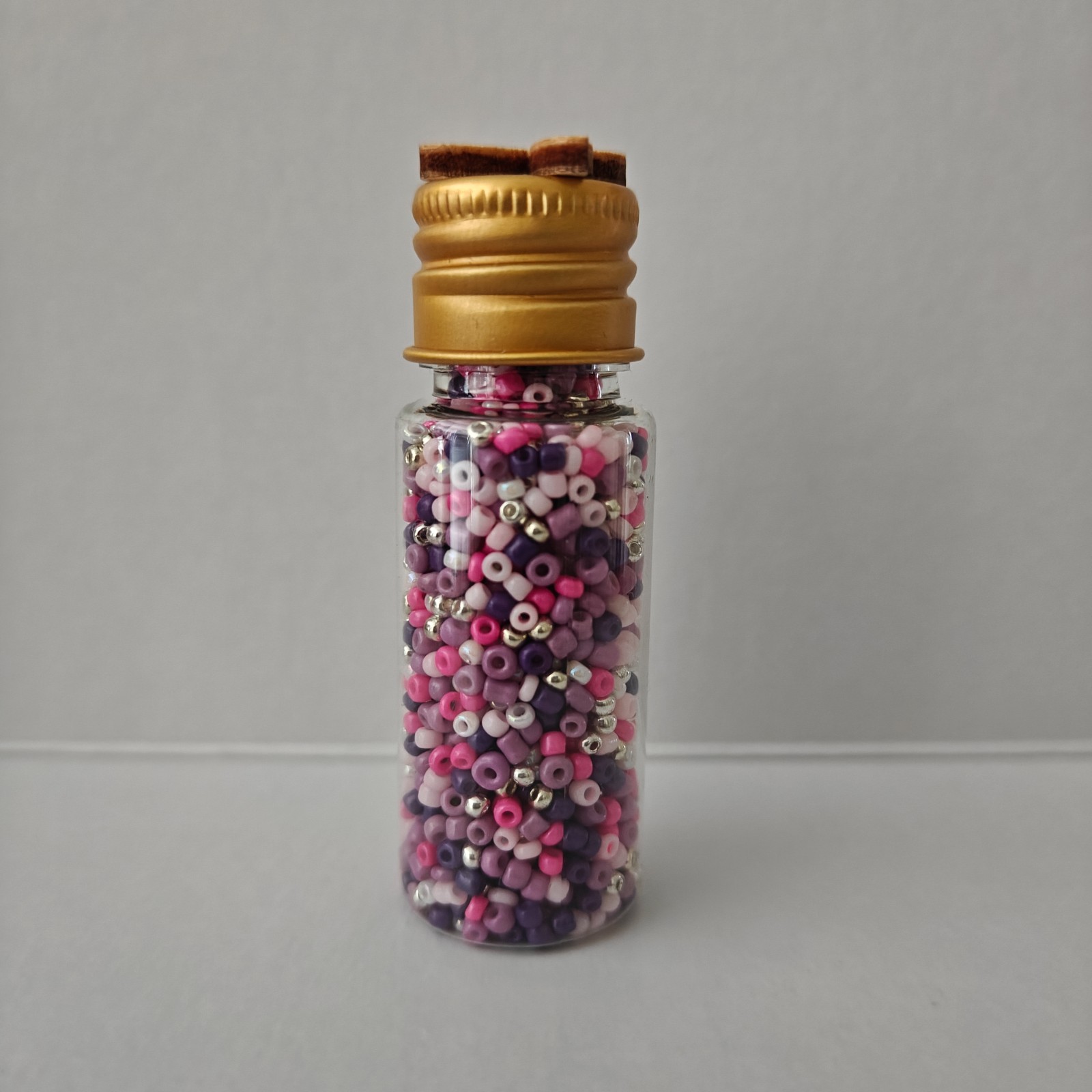 Flesjes gevuld met 2mm rocailles (partij 1)