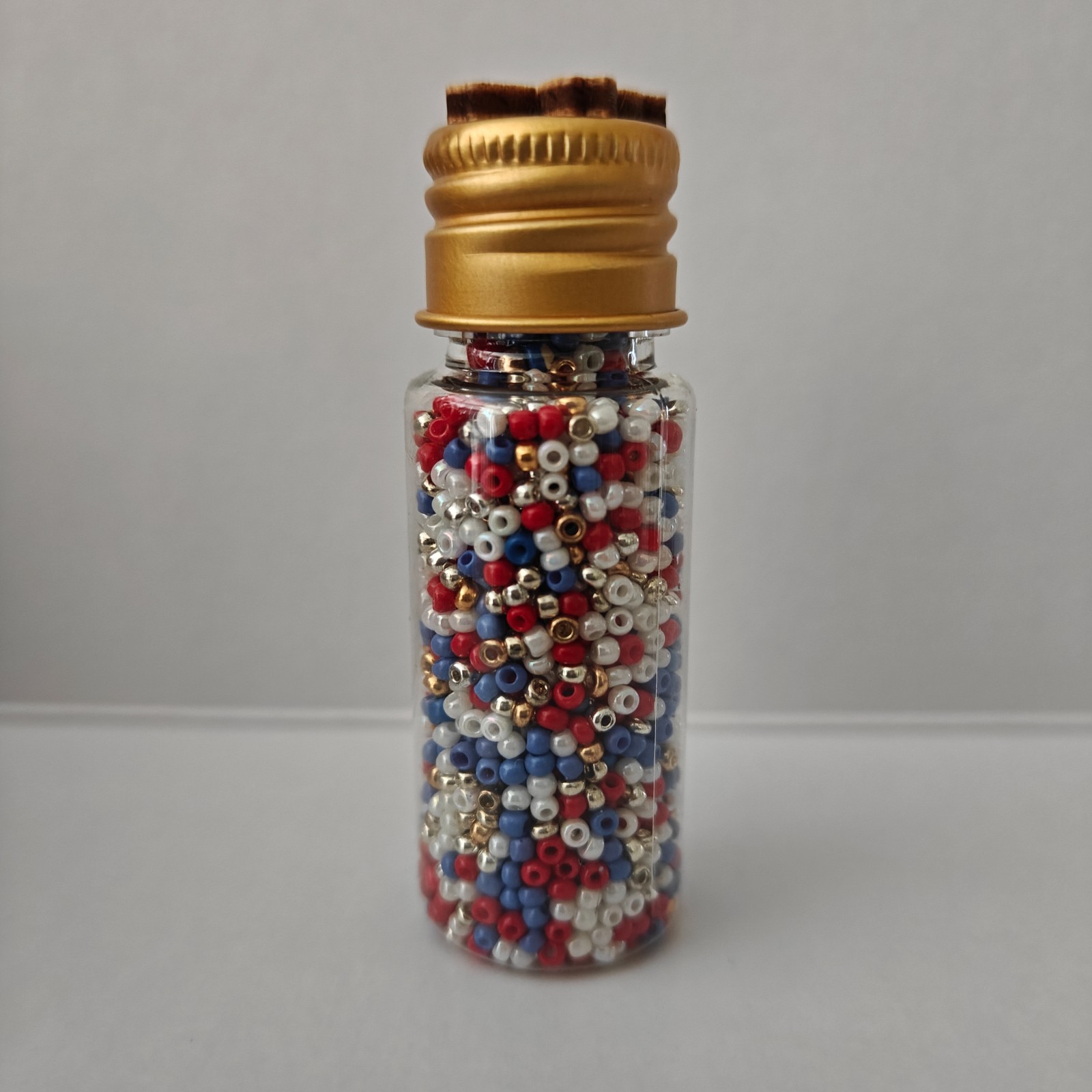 Flesjes gevuld met 2mm rocailles (partij 1)