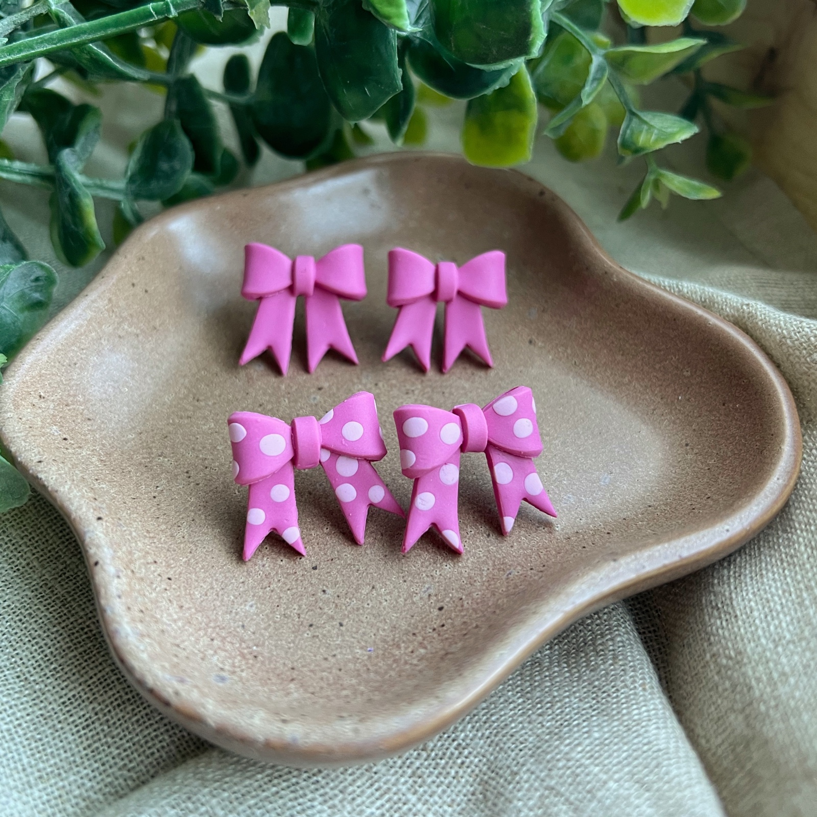 Roze strikjes oorbellen handgemaakt