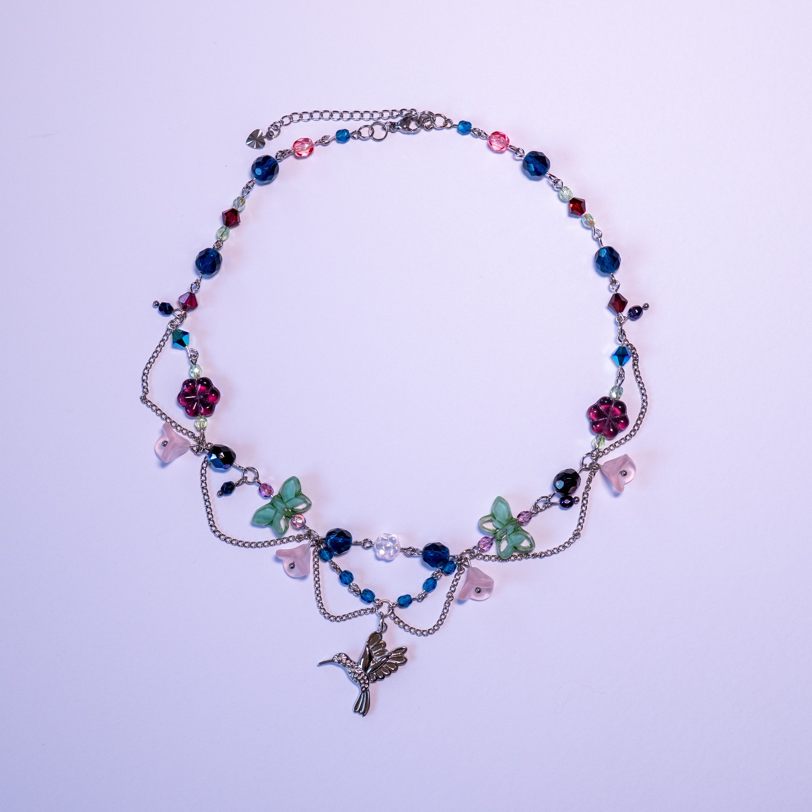 Ketting met kolibri en bloemenkralen