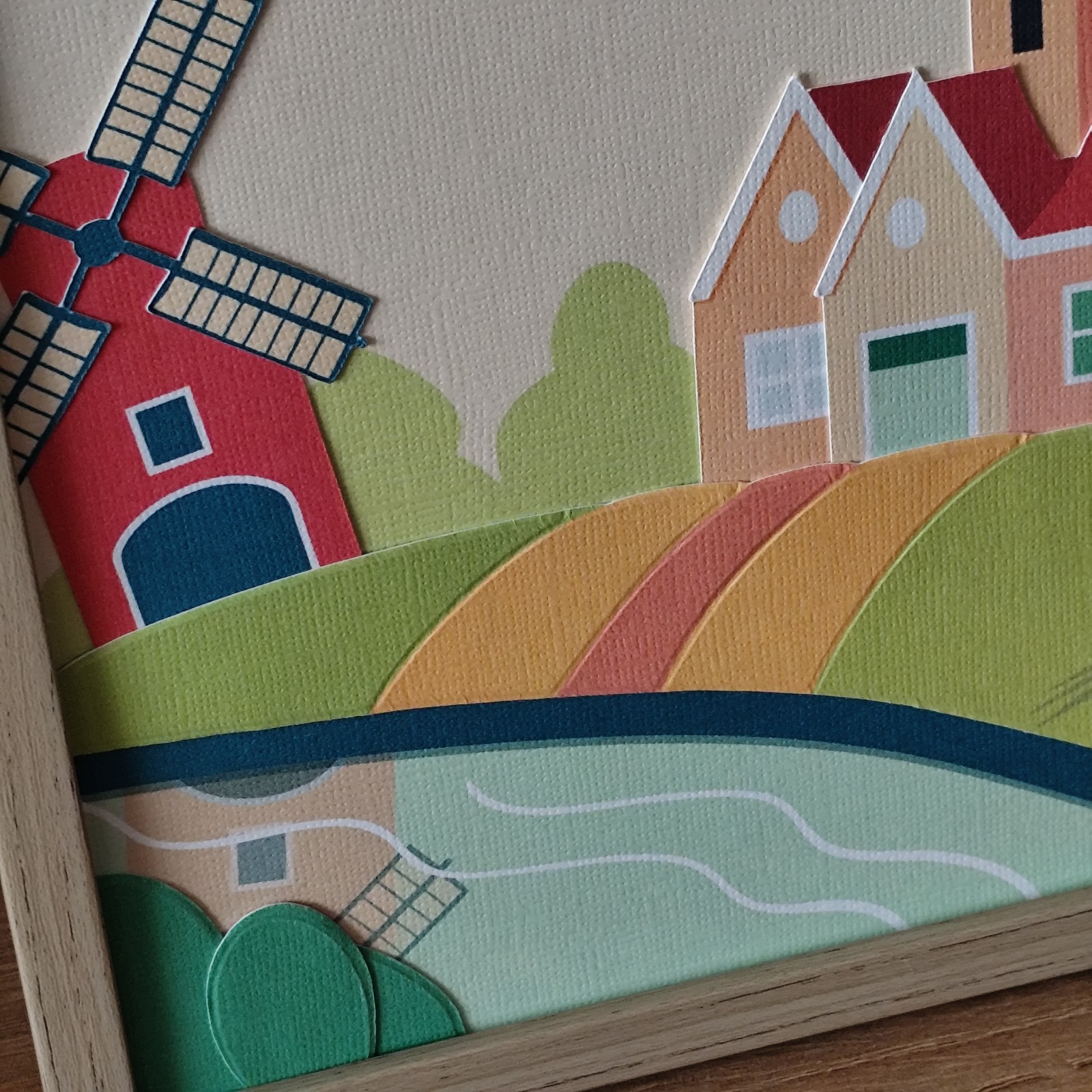 Paper cut-out art – handgemaakte illustraties: Zomerse dorpsidylle