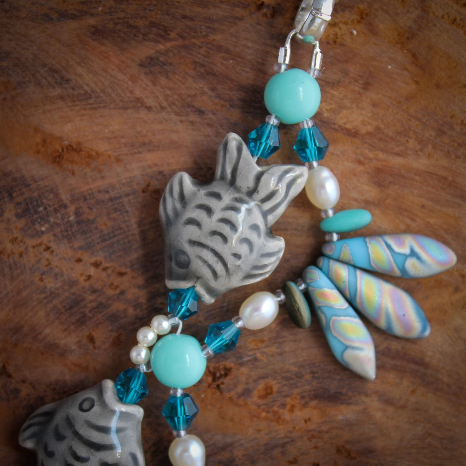 Dansende Vissen & Eigenzinnig, handgemaakte statement ketting met vissen