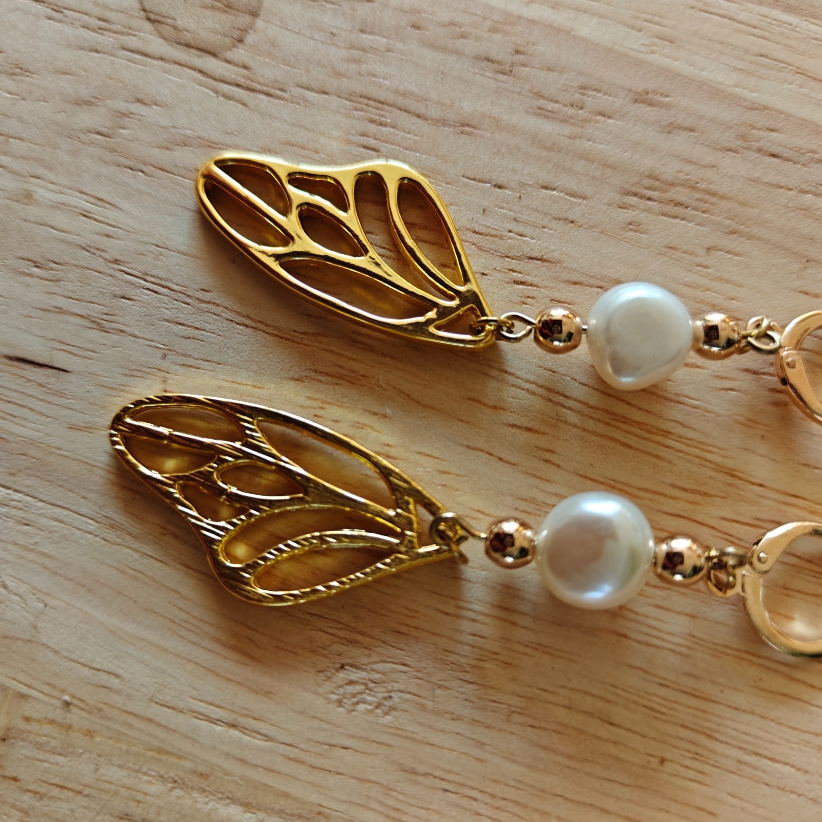 Parel oorbellen in flesje