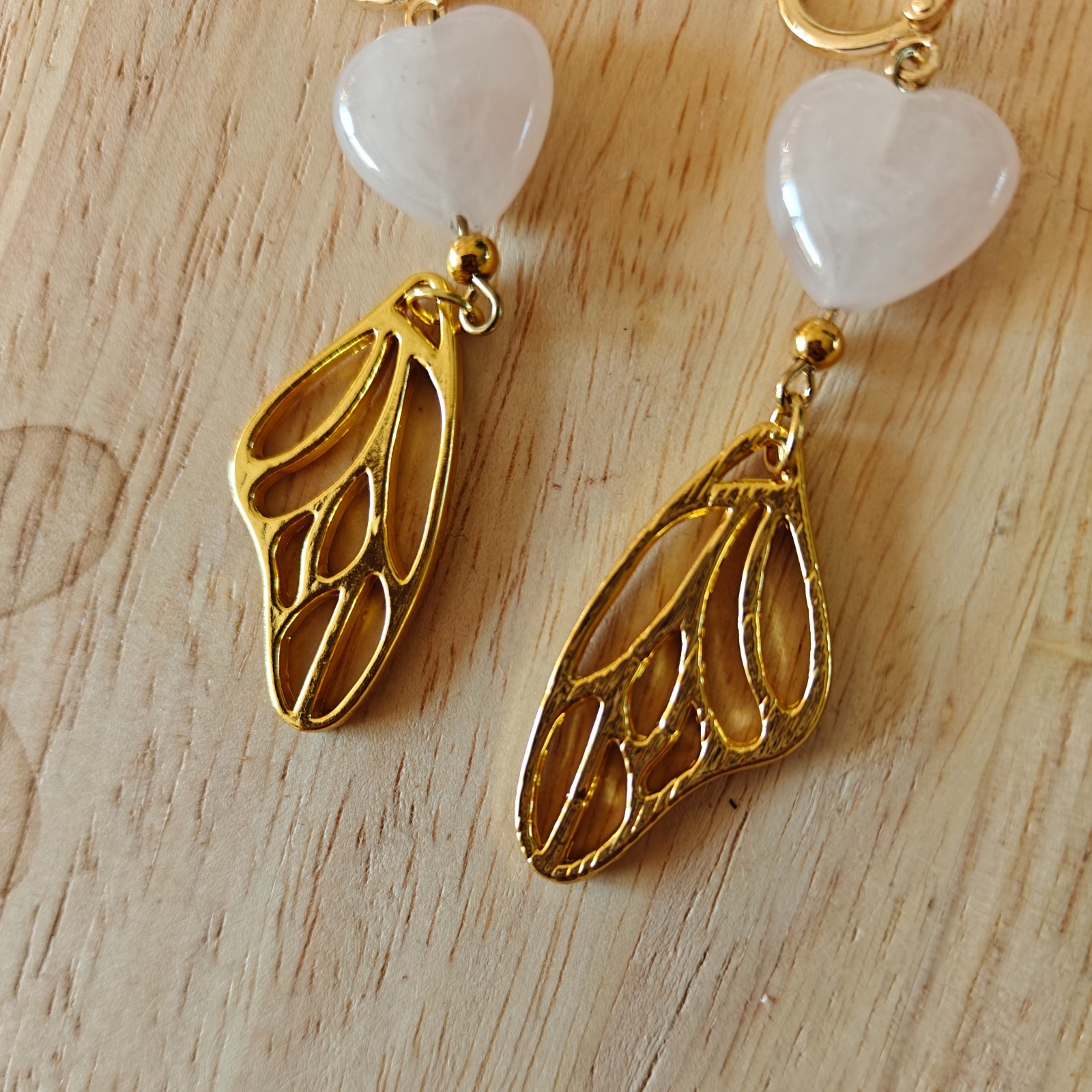 Rozenkwarts oorbellen in flesje