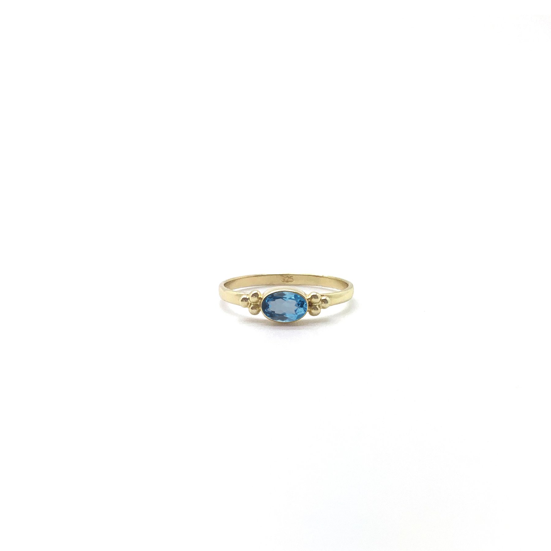 Tiny Facet Swiss Blue Topaz Oval Triquetra Gold