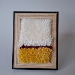 mini aaibare kunstwerkje in listje Een Rode Draad