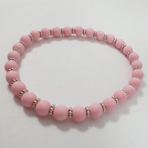 Pastel roze en zilver kralen rek armband