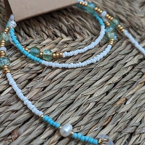 Alternative view of Zonnebrilkoordje ocean bleu pearls