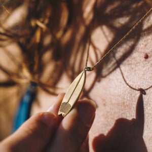 Oceaan ketting surfboard goud