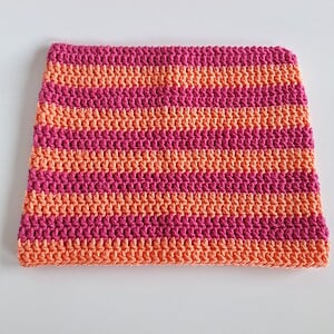 Gehaakte muts 'Coral & hot pink'