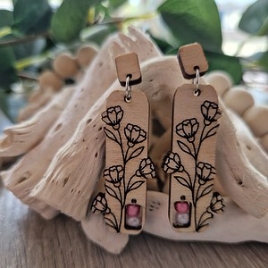 Oorbellen met bloemmotief met een spark of pink