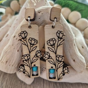 Oorbellen met bloemmotief met een spark of turquoise