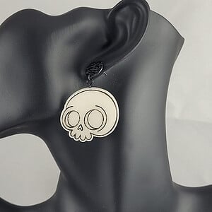 Schedel glow in the dark oorbellen