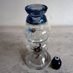 SPIN  in de AANVAL glasobject met kandelaar functie