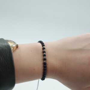 Blauwe goudsteen armband met 14 karaat geelgouden kralen
