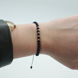 Blauwe goudsteen armband met 14 karaat geelgouden kralen